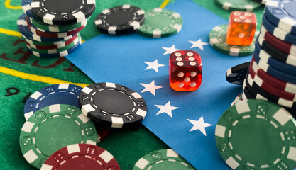 Dice, chess pieces, playing cards, wooden checkers and dominoes for board games on a light table. flag of the European Union