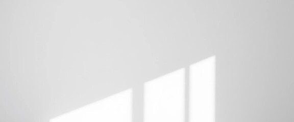 Obraz premium A stark white wall, textured surface, subtle shadows, interior, minimalist background