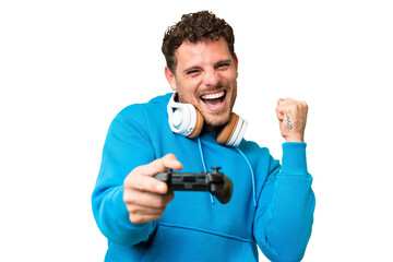 Brazilian man playing with a video game controller over isolated chroma key background
