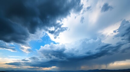 Obraz premium Dramatic storm cloudscape over a distant mountain range, showcasing a breathtaking contrast of dark, brooding clouds and a vibrant blue sky peeking through. : Generative AI