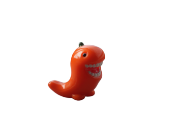 Cute orange cartoon monster figurine toy isolated on happy smiling expression playful design fun on transparent background red kid