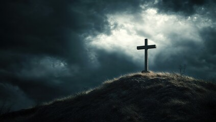 Naklejka premium Under a stormy, overcast sky, a solitary cross stands on a grassy slope, sacred beams of light emanating from gaps in the clouds