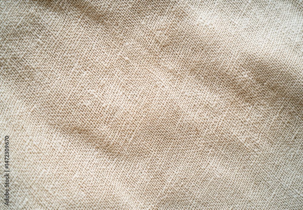 Aufkleber Close-up view of a beige, textured fabric with a subtle weave pattern, ideal for textile design or background use.  The image showcases the natural, slightly rough surface of the mater : Generative AI