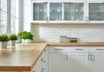 Fototapeta premium Bright kitchen interior with wooden countertop, white cabinets, and glass-front upper cabinets, featuring potted herbs near a large window. : Generative AI