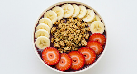 Fototapeta premium Açaí bowl with fruit and granola, colorful and creamy, isolated on white background, perfect for healthy food or smoothie bar promotion.
