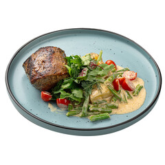 Portion of grilled beef mignon steak with vegetables