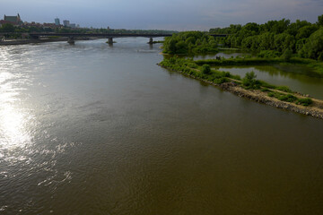 bridge over the river at sunset