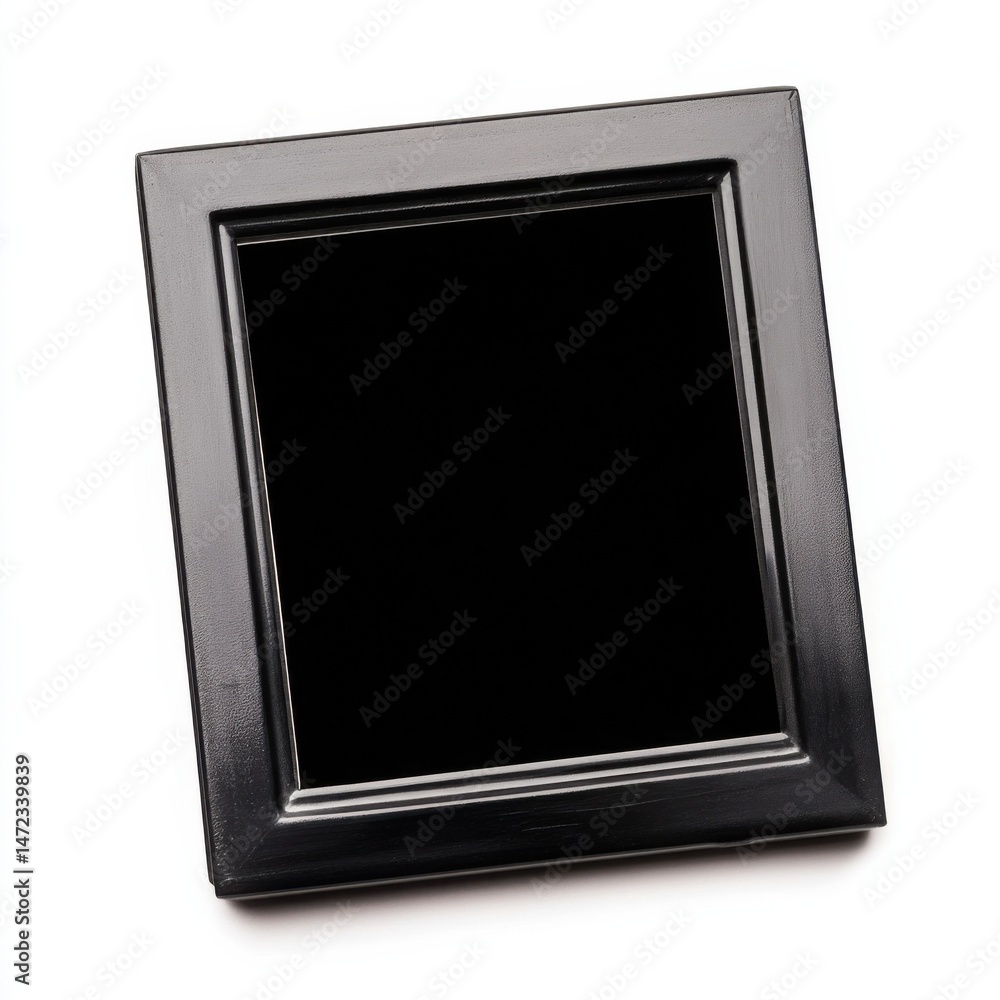 Poster A simple, black, rectangular picture frame sits angled on a white background, ready for a photograph or artwork.  The frame is a classic style, perfect for adding a touch of elegance t : Generative AI