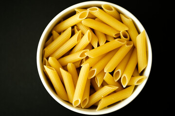Single Bowl Of Uncooked Italian Style Penne Pasta