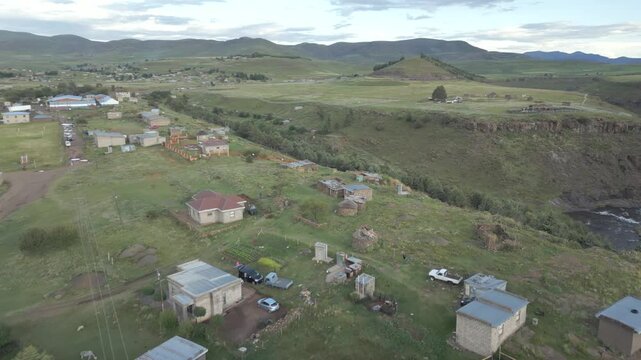 Semonkong village, river and farmlands seen from above. Rural Lesotho landscape
