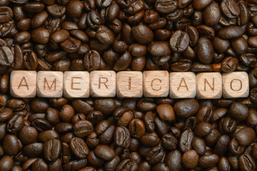 Americano blocks on coffee bean background highlighting coffee culture