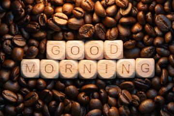 Good morning message with wooden blocks on coffee bean background