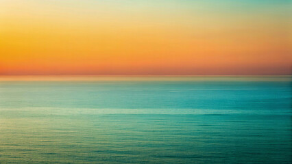 Fototapeta premium An orange and blue gradient resembling a sunset over water