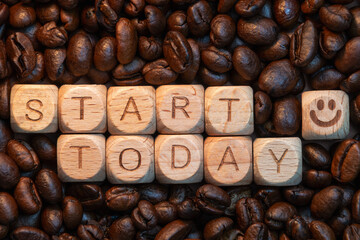 Inspirational coffee bean background with motivational message start today