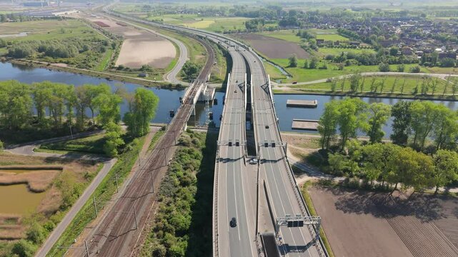 Dynamic Aerial Shot of A11 Bridge and Waterway | FlyLens Cinematic