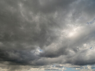 Blue cloudy sky, nature background for design. Clouds have random shape and form.