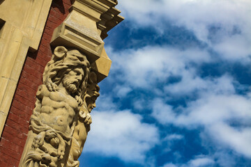 Detail of french architectural stone decoration on classic building facade in the old historic city...