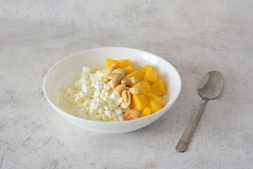 Healthy Cottage Cheese Breakfast Bowl with Mango and Cashews