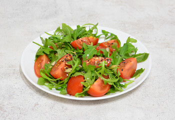 Fresh Salad with Arugula, Tomatoes and Sesame Seeds