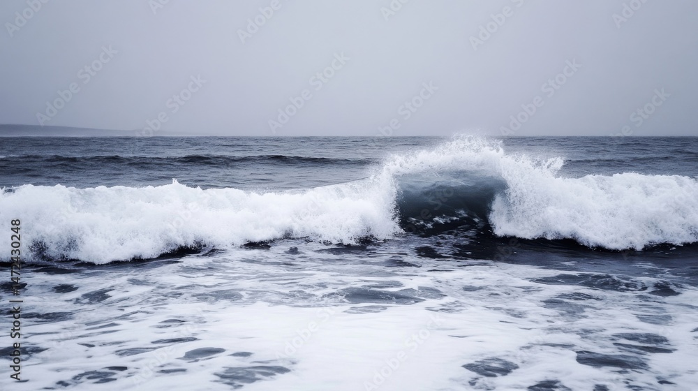 Aufkleber A powerful ocean wave crashes on the shore, creating a dramatic display of white foam and dark blue water under a moody sky. : Generative AI
