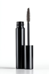 Obraz premium A dark brown mascara wand stands upright next to its sleek, black cylindrical tube, isolated against a bright white background. : Generative AI