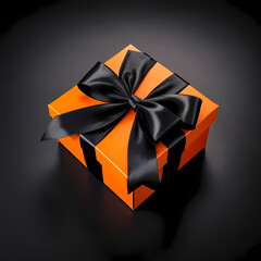 A vibrant orange gift box with a luxurious black ribbon bow, creating a contrast between colors and textures, isolated 
