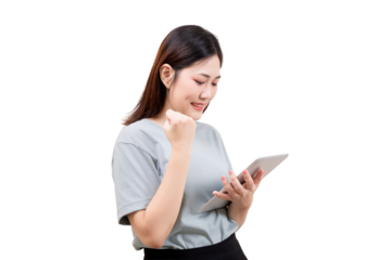 Asian beautiful Young woman celebrates while using a tablet, showing excitement and success.