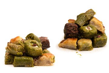 Turkish pistachio baklava isolated on a white background. A variety of turkish sweet baklava.