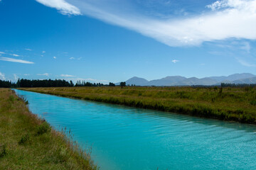 Turquoise River in a Scenic Landscape