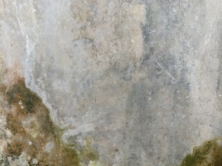 Mossy Concrete Wall with Natural Weather Stains. Close-up of a concrete wall with natural moss, grime, and water stains, offering a gritty, organic texture perfect for backgrounds