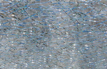 Close-up with the texture of a cracked safety glass