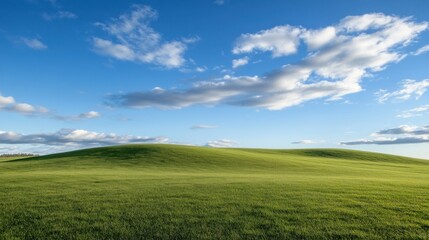Fototapeta premium Rolling green hills under a vibrant blue sky with fluffy white clouds, a picturesque landscape perfect for nature photography or travel brochures. : Generative AI
