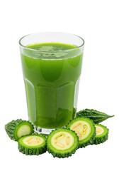 Refreshing green juice in a glass, surrounded by sliced bitter melons. Healthy and natural