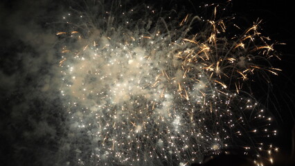 fireworks background. festive fireworks sky. new year, independence day, christmas, birthday. explosion colored lights. fiery flame sky. happy holiday. traditional holiday festival. fire spark effect.