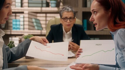 Team multinational women females office businesswomen business financial crisis problem...