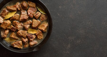 Braised beef in cast iron skillet