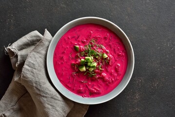 Beet cream soup with yogurt, cucumbers and dill