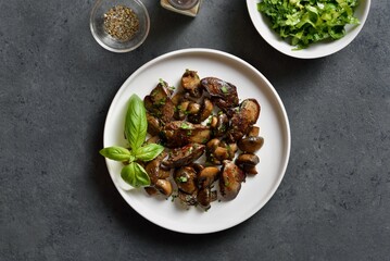 Fried chicken liver with mushrooms