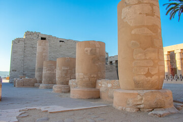 Karnak Temple in Luxor, Egypt. Entrance and Avenue of Sphinxes. Temple complex of Ancient Egypt in honor of the god Amun-Ra