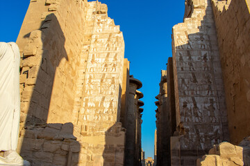 Karnak Temple in Luxor, Egypt. Entrance and Avenue of Sphinxes. Temple complex of Ancient Egypt in honor of the god Amun-Ra