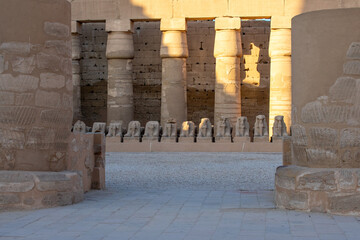Karnak Temple in Luxor, Egypt. Entrance and Avenue of Sphinxes. Temple complex of Ancient Egypt in honor of the god Amun-Ra