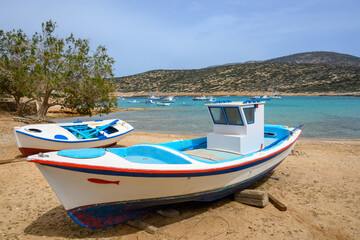 Naklejka premium Boats on the Kalotaritissa Beach. Amorgos, Cyclades, Greece