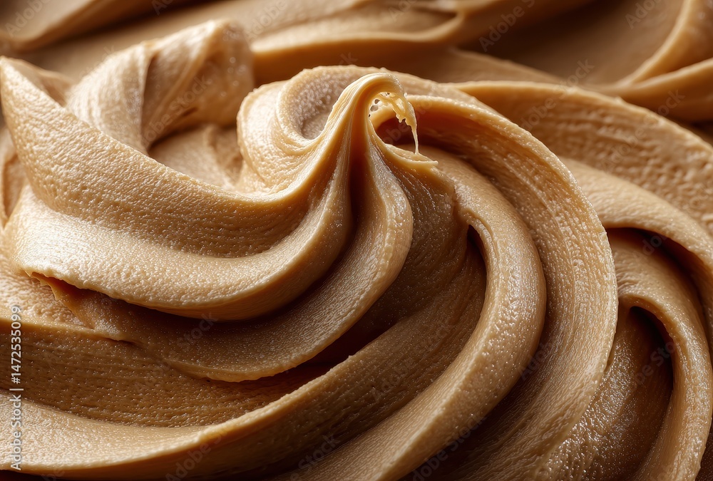 Poster close-up view of smooth creamy peanut butter swirled textures with rich color and glossy finish idea