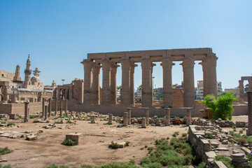 Karnak Temple in Luxor, Egypt. Entrance and Avenue of Sphinxes. Temple complex of Ancient Egypt in honor of the god Amun-Ra