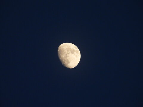 Waxing gibbous moon within the dark nighttime sky. Visible over Kent County, Delaware.