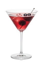 A red drink with ice and black berries in a clear glass on a black background