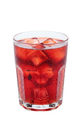 A red drink with ice cubes in a transparent glass.  Refreshing and cooling beverage