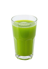 A glass holds green liquid, with a foamy top, and a black background isolates the vibrant drink