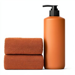 Orange towel set and matching pump bottle for bathroom or spa on a clean white background.