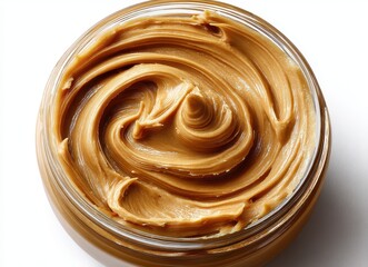 Creamy peanut butter in glass jar with smooth texture, ideal for recipes, spreads, and healthy snacks, showcasing natural ingredients and appetizing appearance
